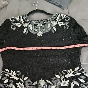 Elegant Black Top with White Beaded Design